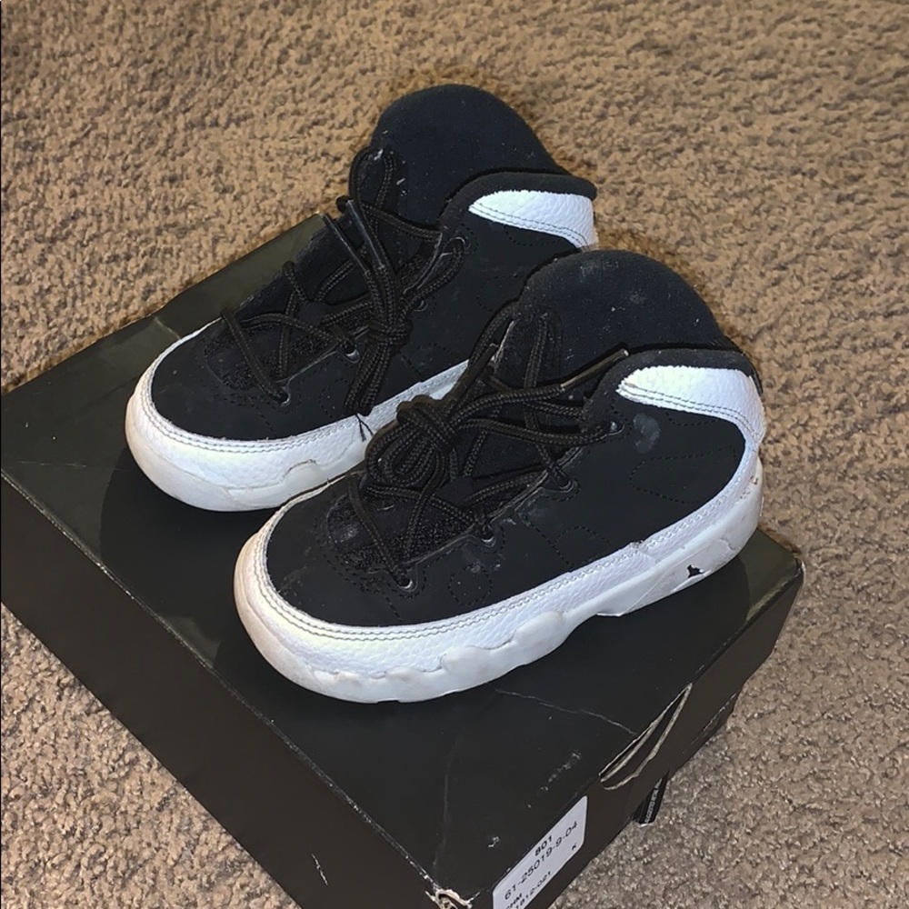 Size 7 Jordan 9s black and white